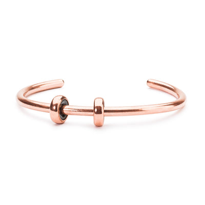 Copper bangle with two copper spacers, providing a warm yet elegant foundation for your Trollbeads bracelet.