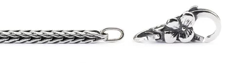 Silver chain with a decorative clasp on a white background