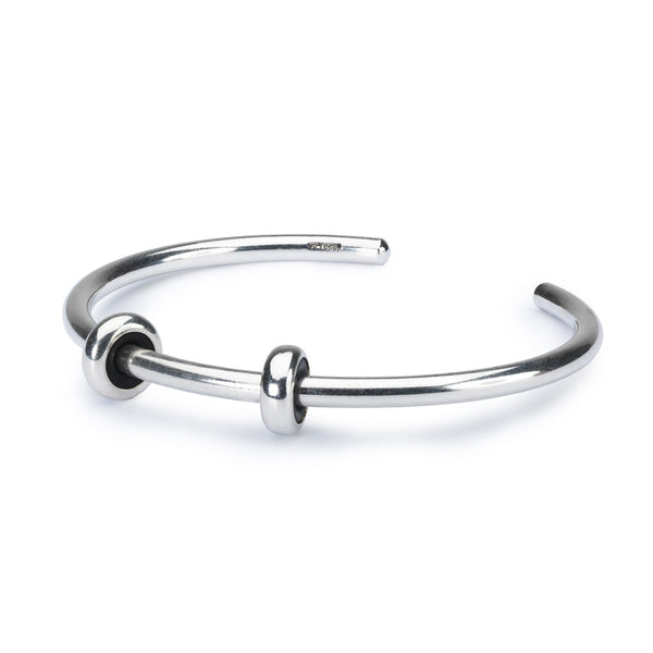 Sterling silver bangle with two silver spacers, providing a simple yet elegant foundation for your Trollbeads bracelet.