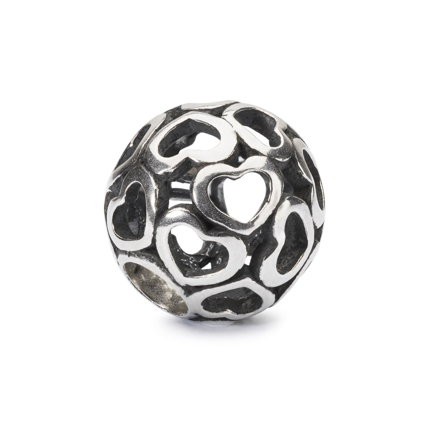 Blanket of Love - a sterling silver bead with a round shape and textured design of multiple hearts all over resembling a cozy blanket.