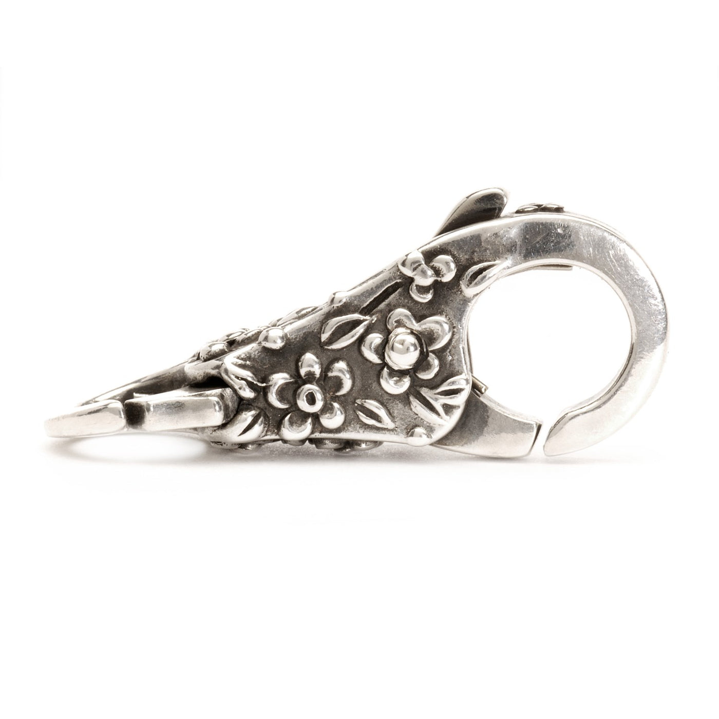 Silver 'Lace Clasp' with a delicate flower design, used to fasten a bracelet or necklace with elegance.