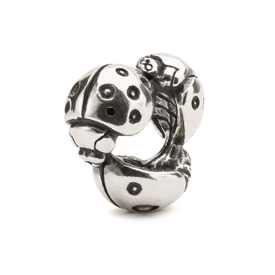 Three Ladybugs form a silver jewellery bead.