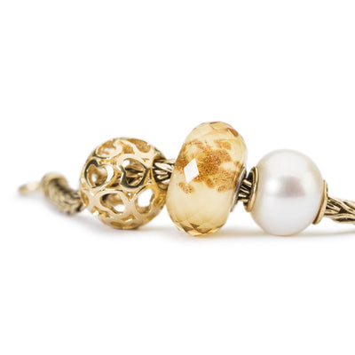 Pearl with Gold Bead