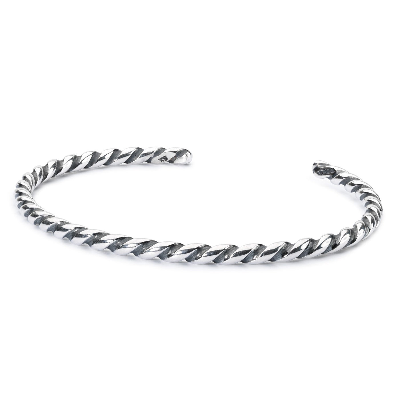 Twisted sterling silver bangle, adding a unique and stylish touch to your Trollbeads bracelet.