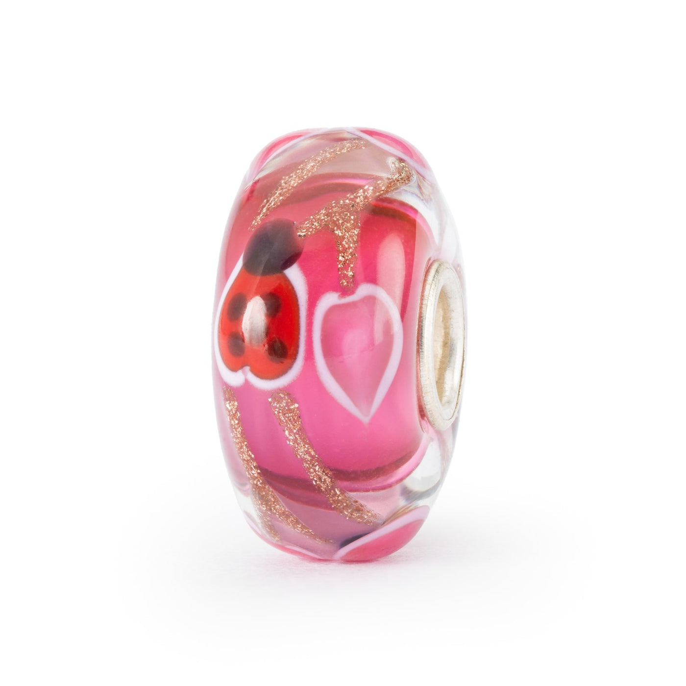 Round glass bead in saturated pink with shades of red is crisscrossed with glittery stripes. Inside are also pink hearts and sweet lady bugs in red and black, with a fine white stroke.