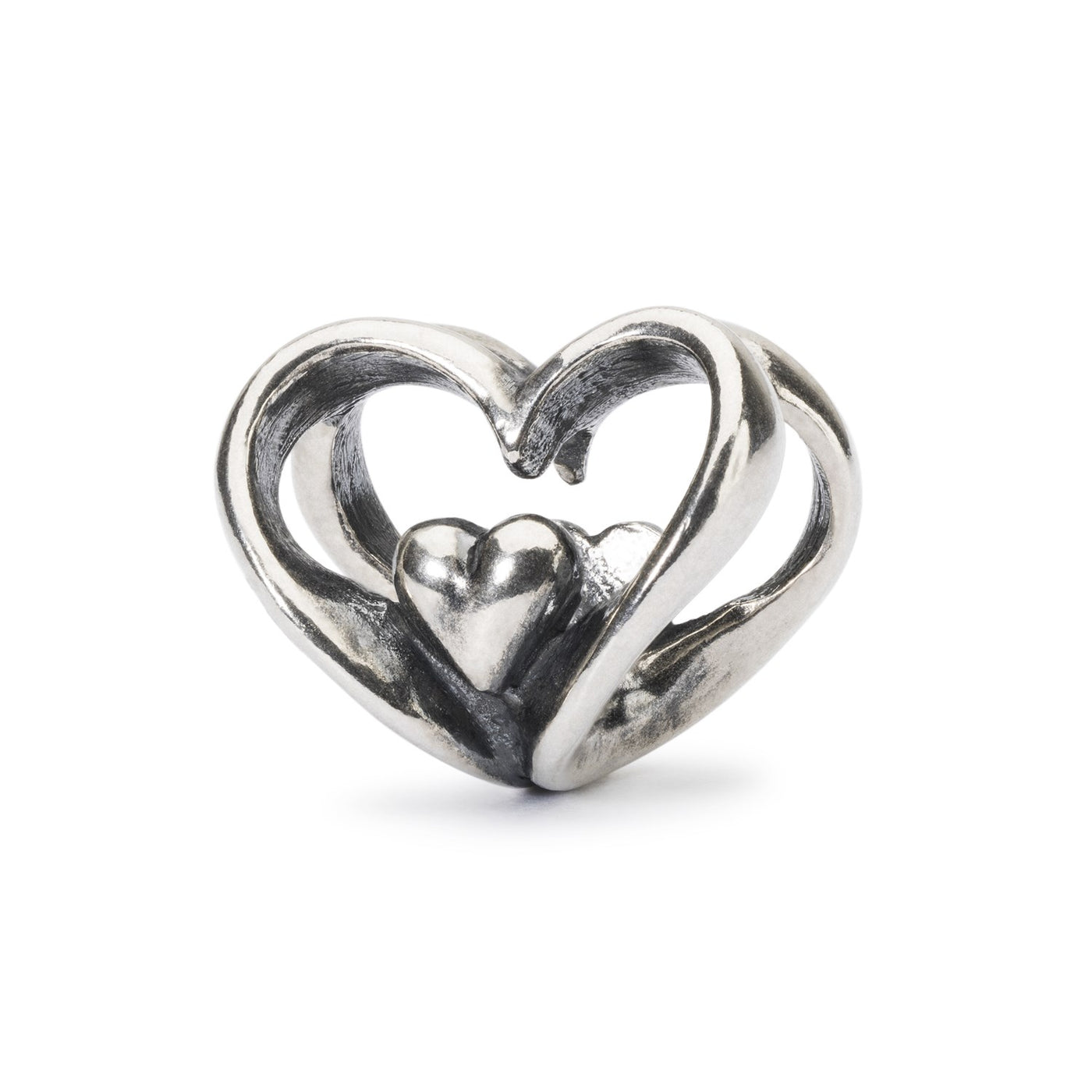 Bead entirely made of silver with two interlocking hearts design that have smaller hearts inside. Symbolizing love and connection.
