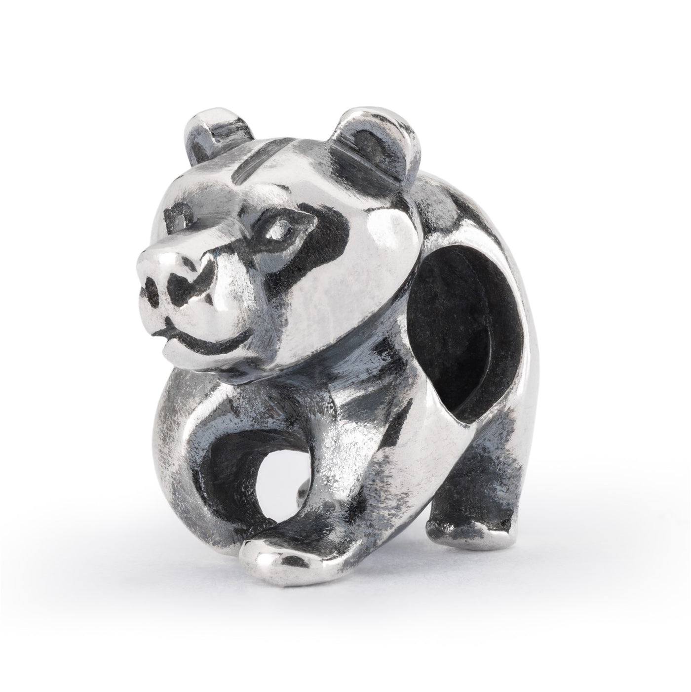 A charming silver bead featuring a cute teddy bear design.