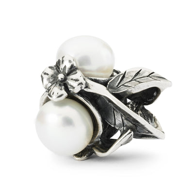 Serene Beauty Bead with silver and pearls that has a delicate floral design, symbolizing peace and tranquility.