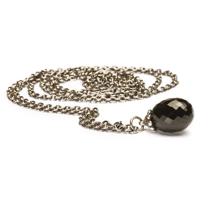Fantasy Necklace with Black Onyx, featuring a sleek chain and a striking pendant made of black onyx that has a faceted cut, adding a touch of sophistication to any outfit.